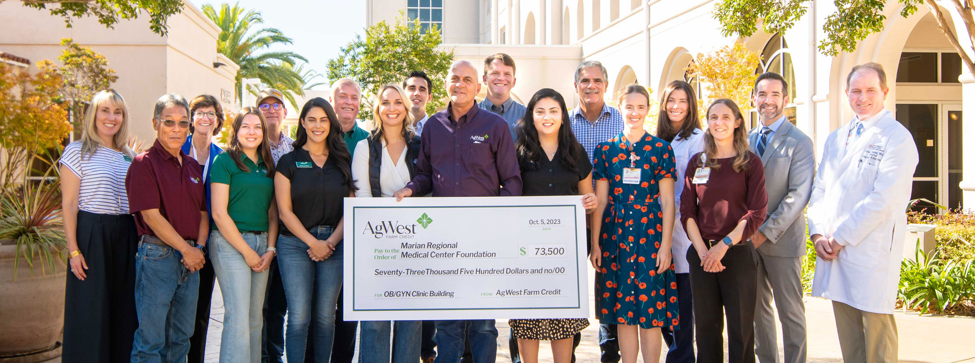 AgWest Farm Credit presenting Marian's OB/GYN Residency Program Clinic with check