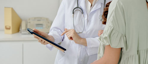 Female doctor with patient