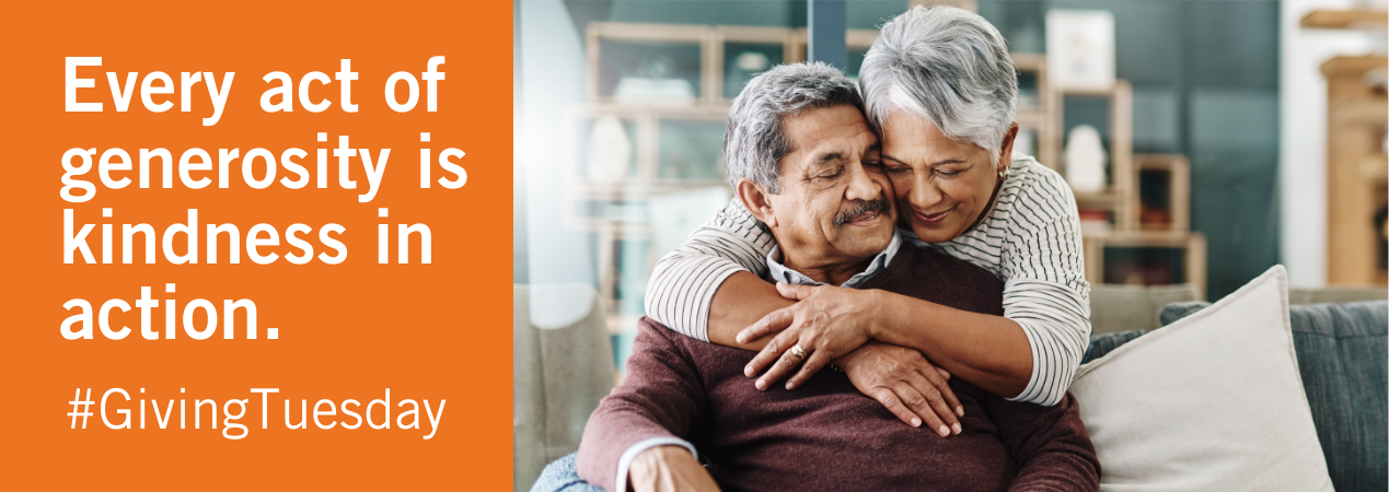 Every act of generosity in action. #GivingTuesday. Image of elderly couple hugging on a couch.