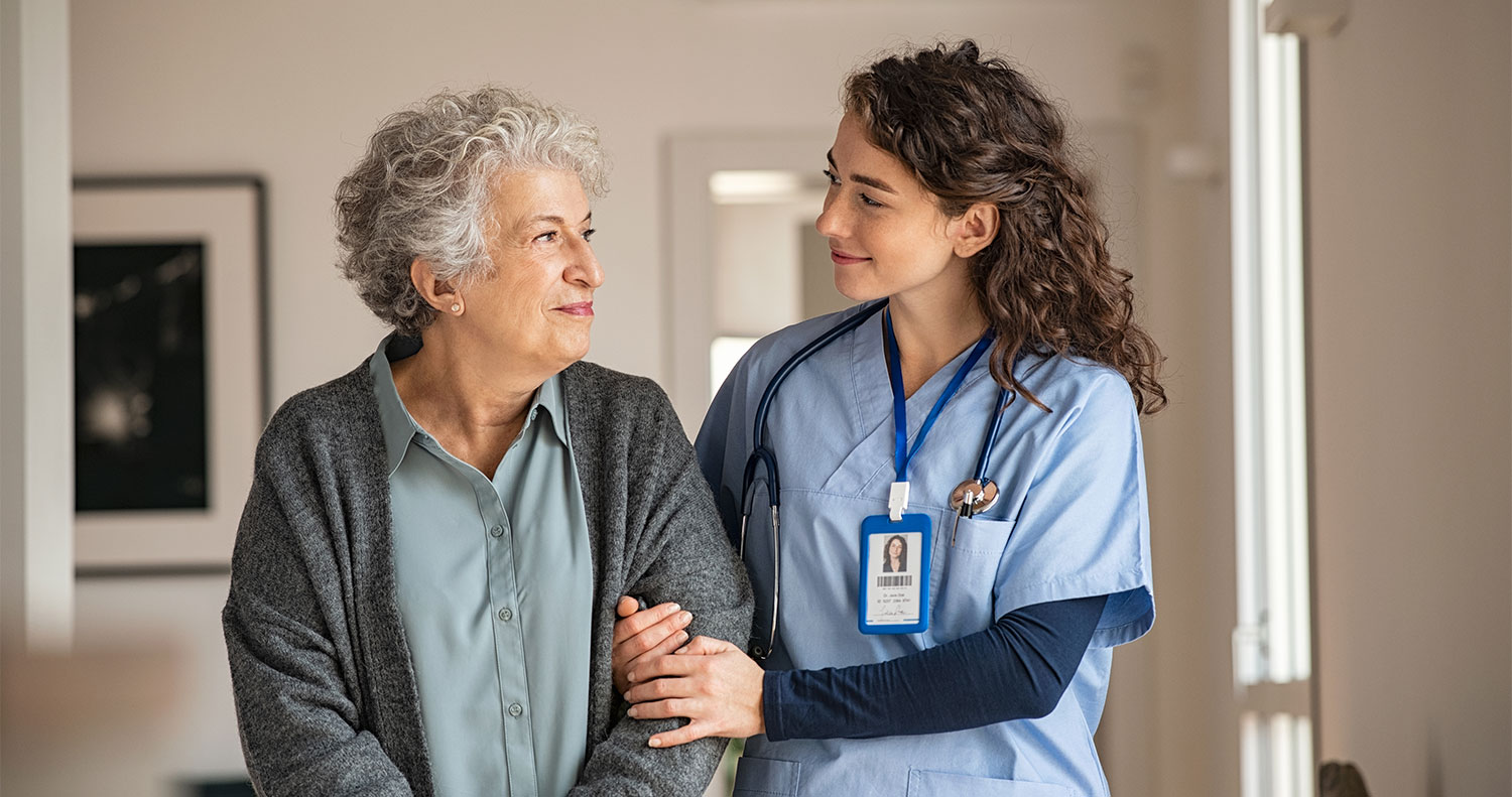 Medical provider with patient walking