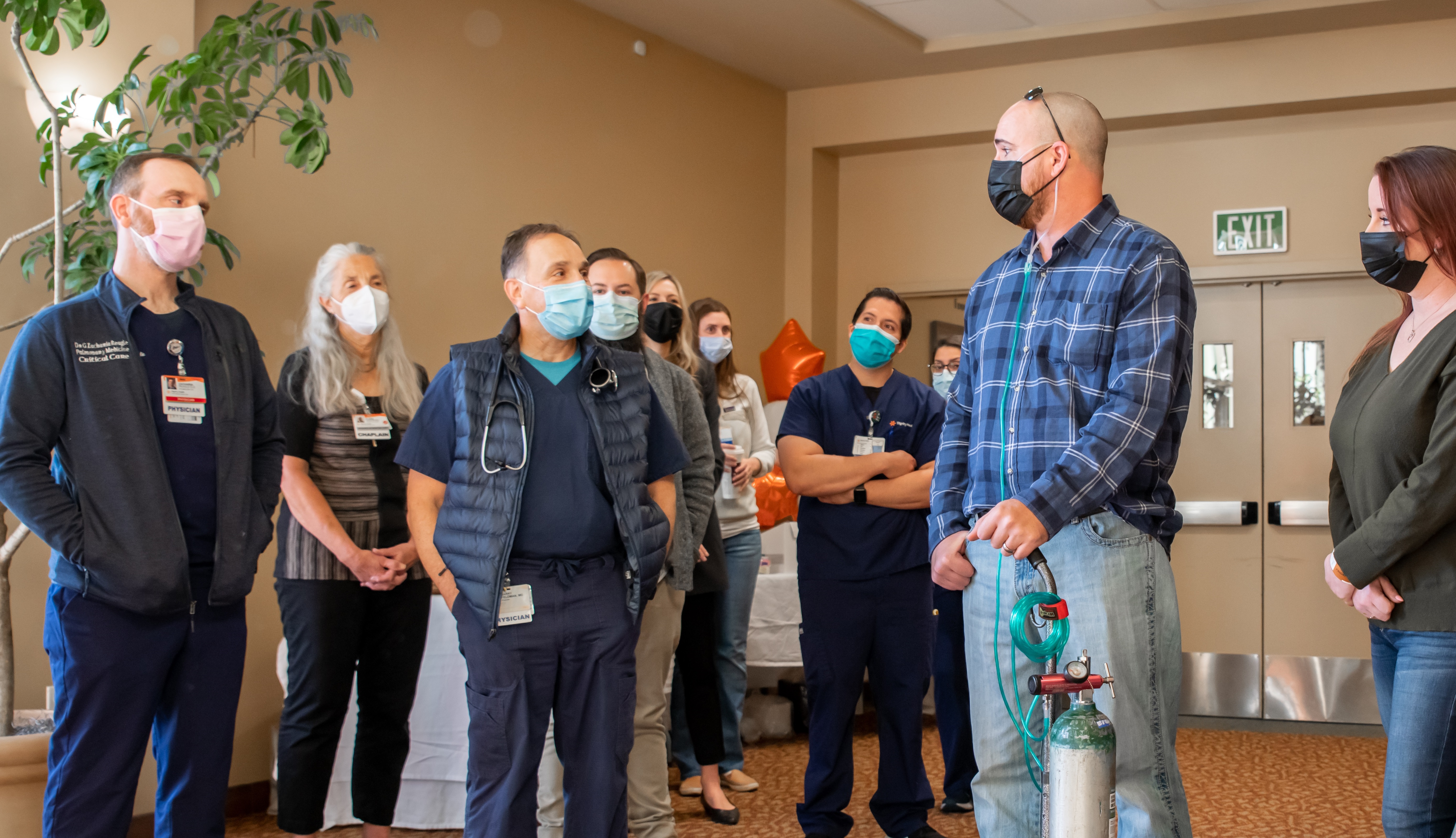 Matt Tracy talking to his care team at Marian Regional Medical Center