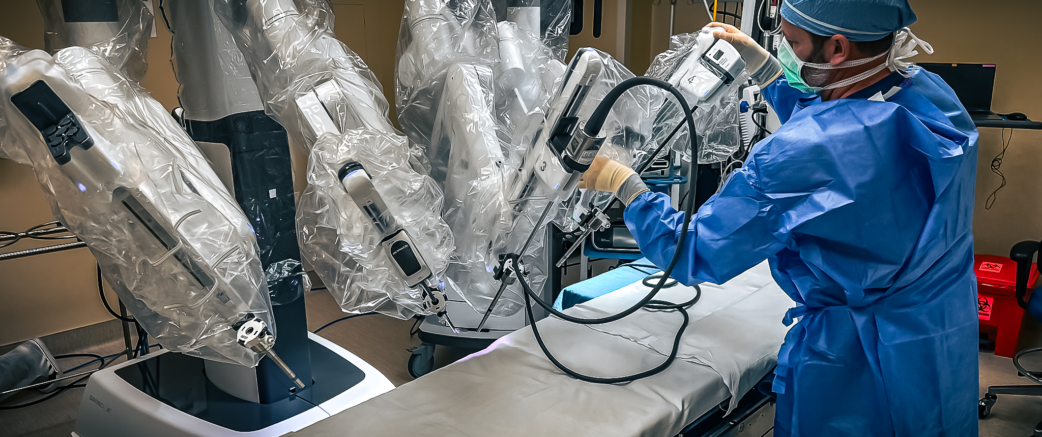 Operating Room Technician Working on Robot