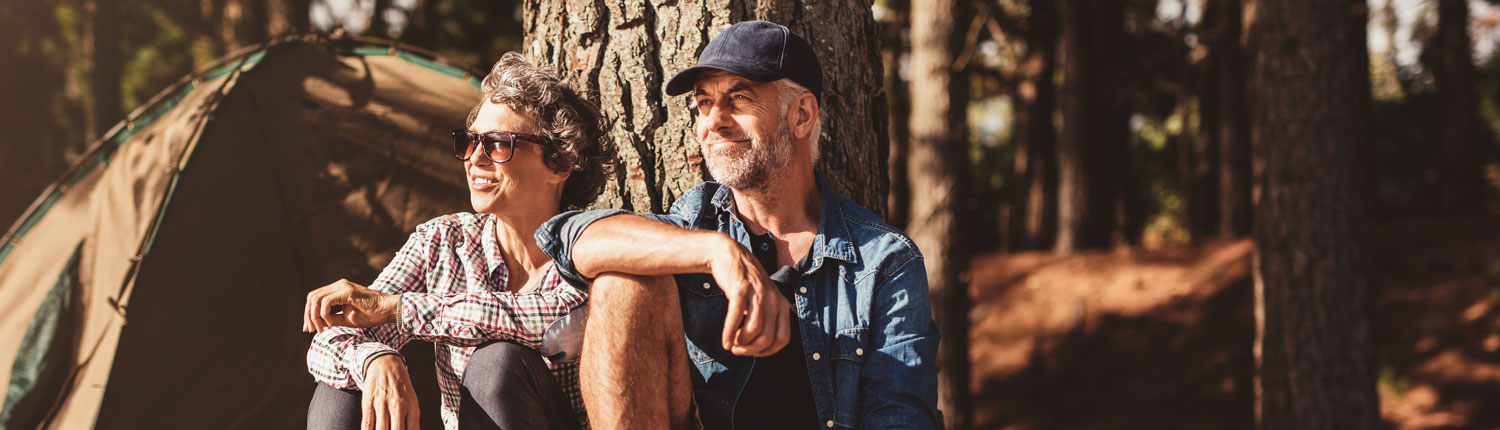 senior couple camping