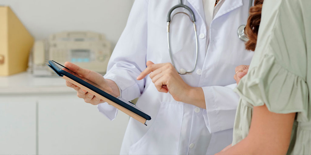 Female nurse with patient